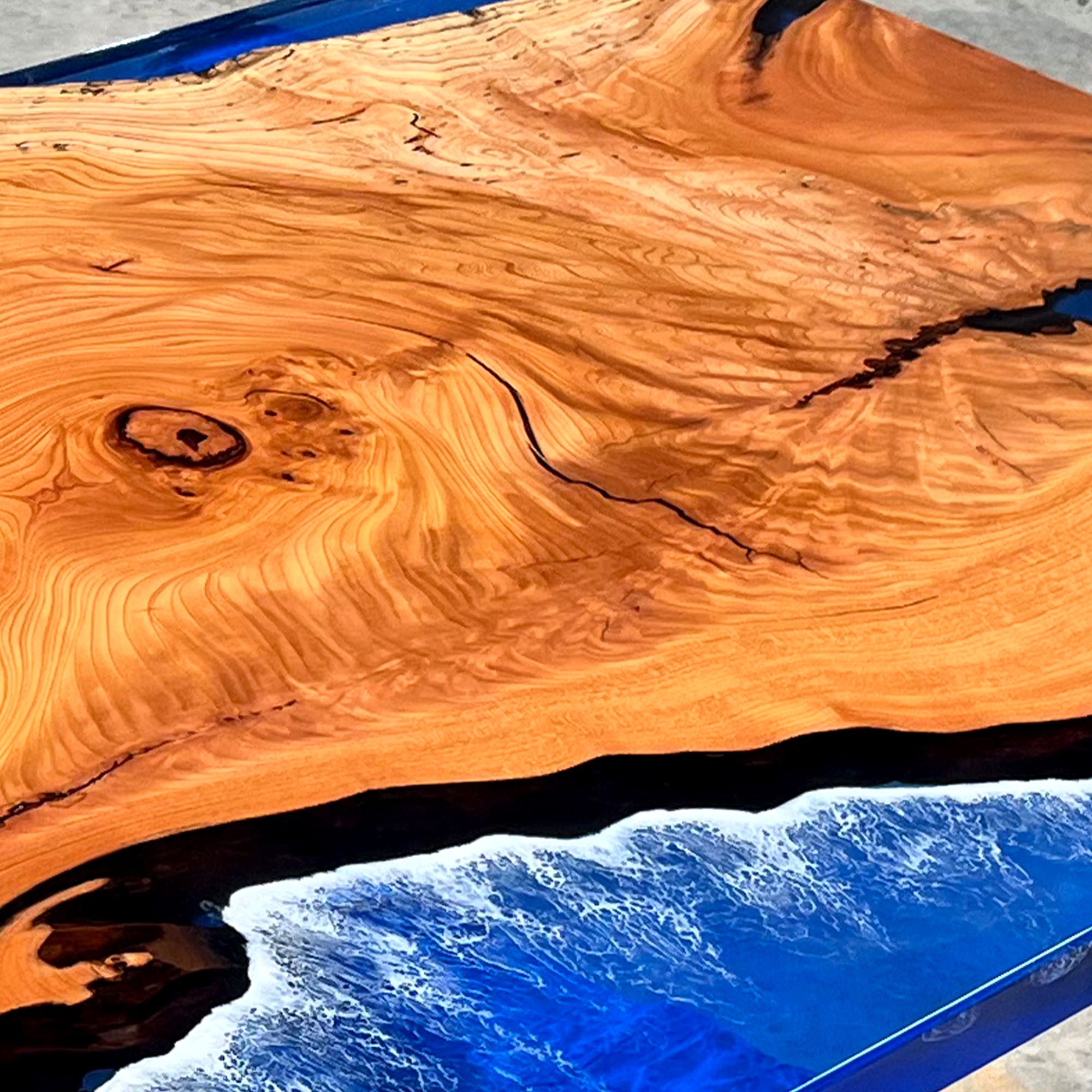 Custom Beech Wood & Deep Sea Epoxy River Table in Austin
