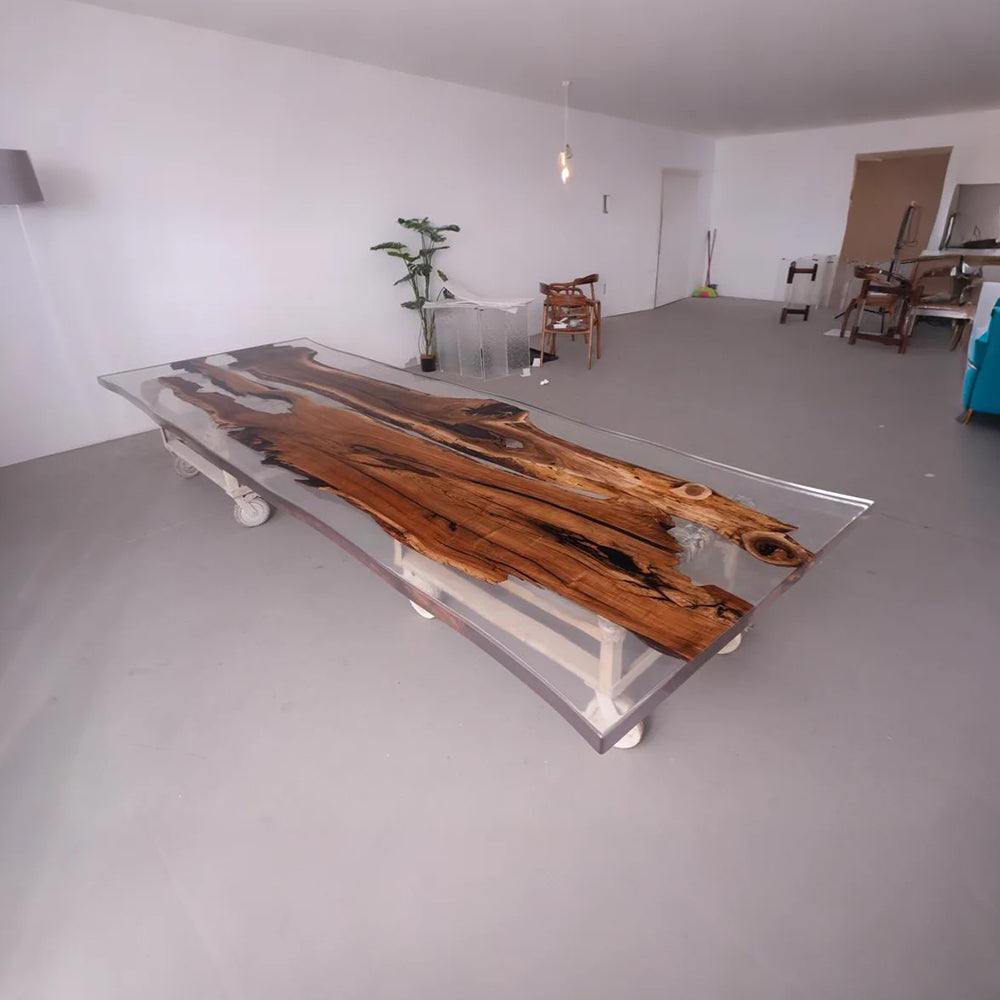 Large wooden dining table with glass tabletop