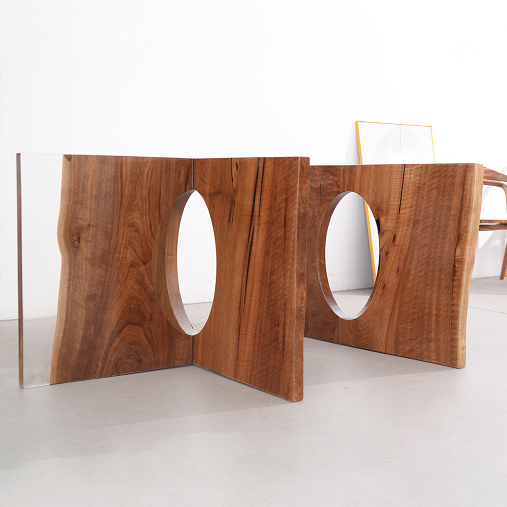 Wooden table legs with circular cutouts